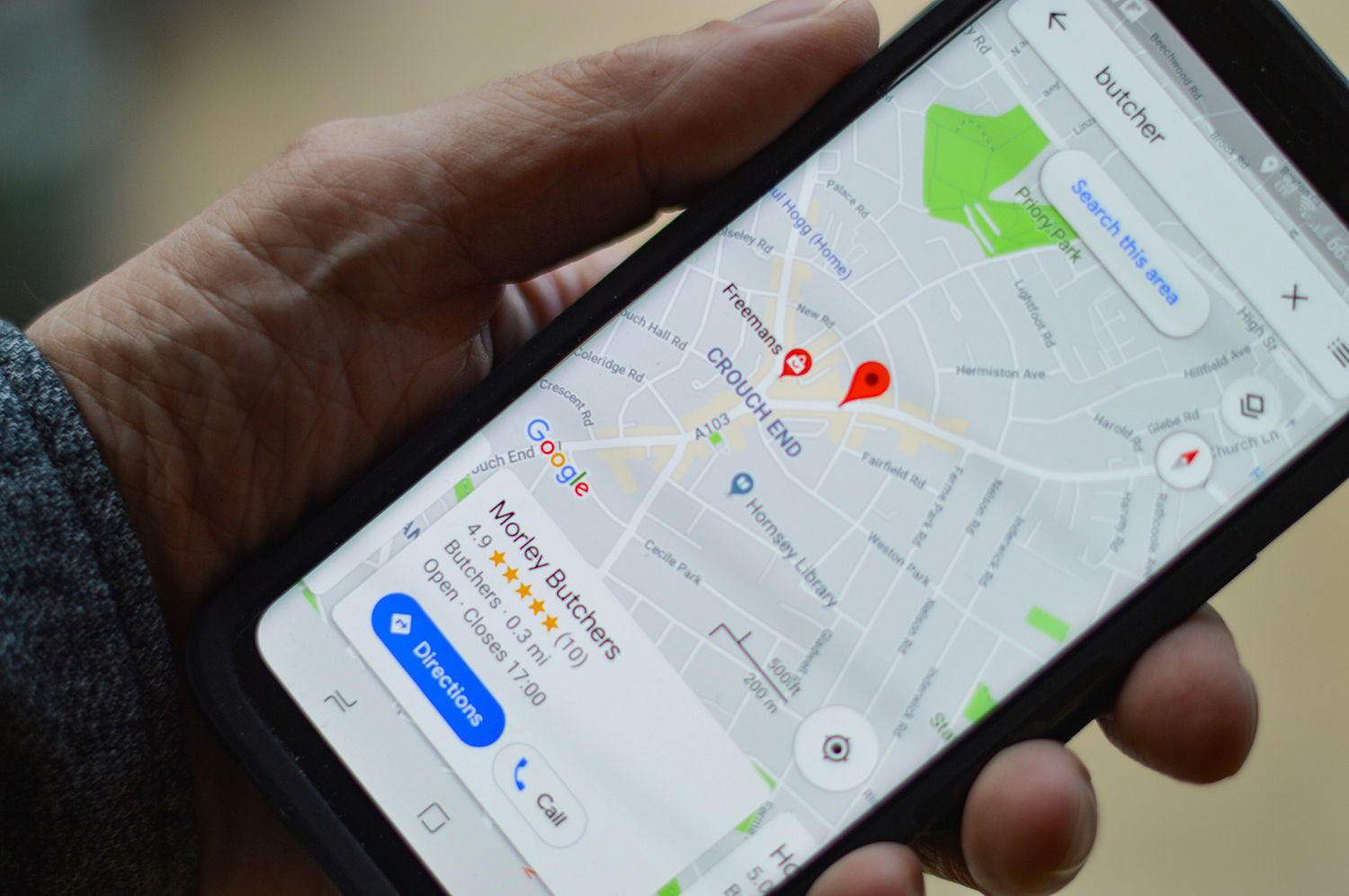 cell phone with google maps showing location of a business, local seo